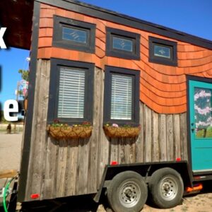 STRIKING Handcrafted Tiny House w/recycled materials & stained glass art