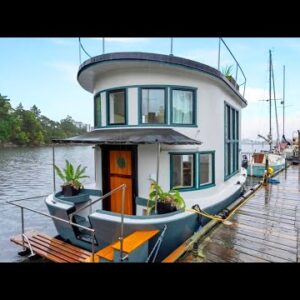 The Coziest Tiny House Boat For those Looking for a Waterfront Lifestyle