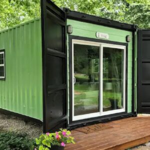 Absolutely Gorgeous Green Pine Container Home offers BIG Living In A Tiny Space