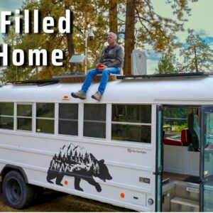 He built a $35k Tech-Filled Tiny Home Skoolie to live a full life!