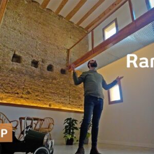 Turns neglected housebarn into light-filled rammed-earth home