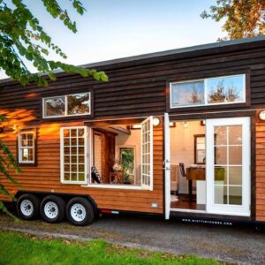 The Coziest Tiny House with Large Casement Window by Mint Tiny Homes