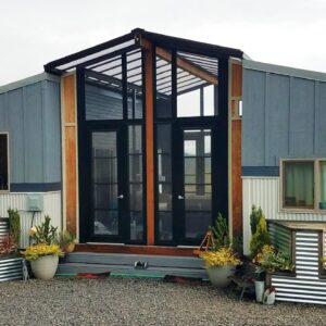 THE OHANA Tiny Homes connected with a sunroom deck in between