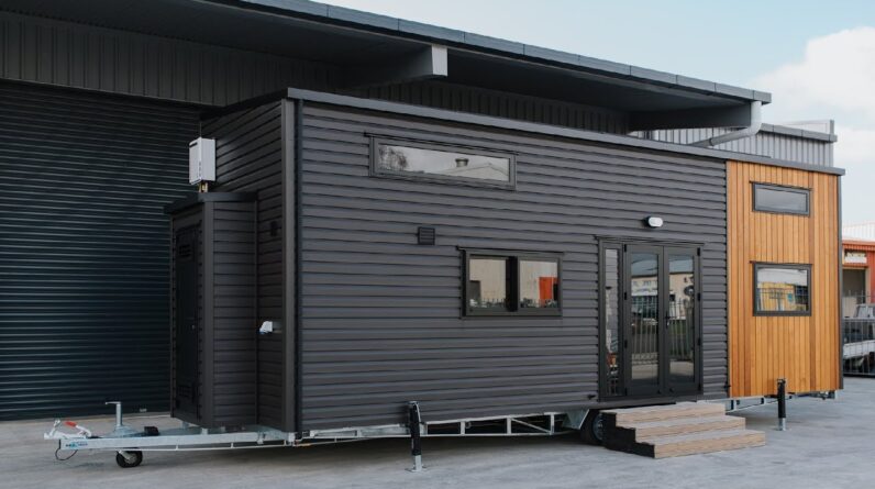 Possibly The Coziest Black Kingfisher Tiny House in NZ