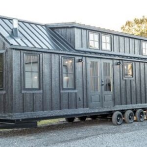 Exceptionally Cozy Bunkhouse Tiny House Model by Timbercraft Tiny Homes